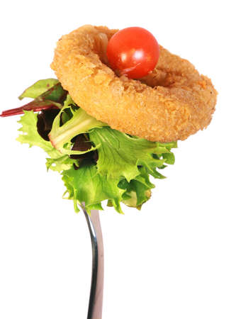 Calamari Ring with salad on the forkの写真素材