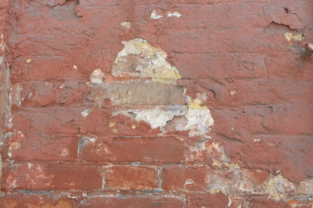 Old weathered brick wall fragmentの写真素材