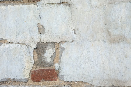 Old weathered brick wall fragmentの写真素材