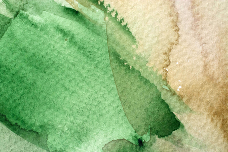 great green watercolor background - paints on a rough texture paperの写真素材