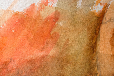 orange brush strokes of oil paint on the paletteの写真素材
