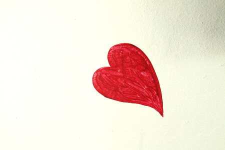 oil painting in shape of heart on the concreate wall.の写真素材