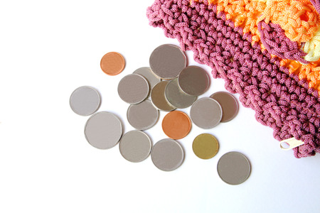 Many coins pouring from bag.の写真素材