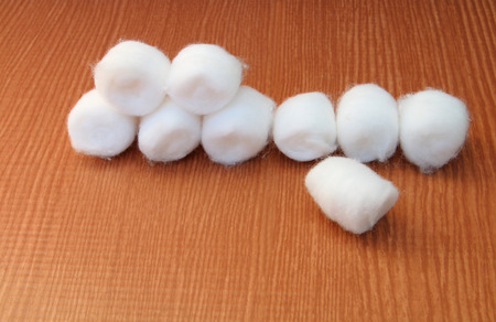 image of cotton swabs on the wooden background