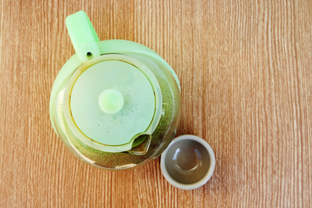 top view of teakettle and teacup.teakettle made from plastic and glass.の写真素材