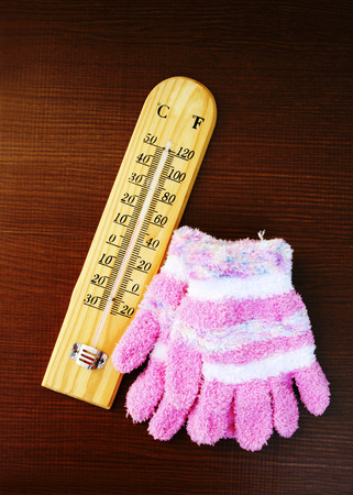 thermometer and pink gloves in vintage toneの写真素材