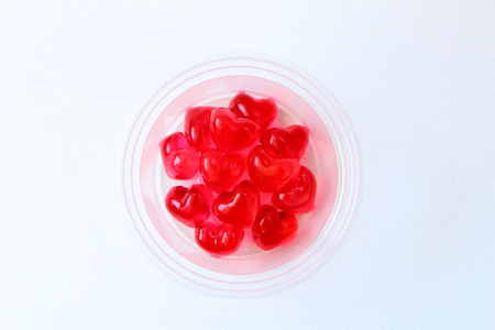 red heart jelly in the clear plastic cup
