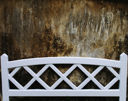 image of white fence and dirty wallの写真素材