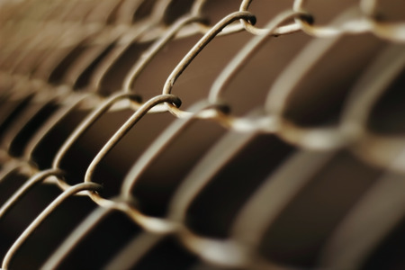 blur net fence in dark toneの写真素材