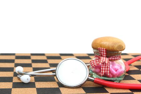 stethoscope and capsule bottle ,isolated white background and saved clipping pathの写真素材