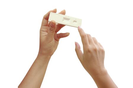 hand holding pregnancy test ,isolated white background and saved clipping path