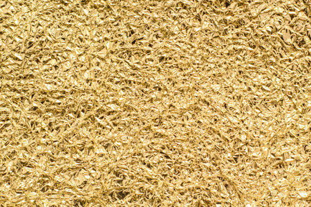 Gold foil texture background for web site or mobile devices. High quality photoの写真素材