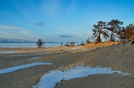 Russia. The Eastern Siberia. Lake Baikal, the sandy shore of the Olkhon Island from the Small sea.の写真素材