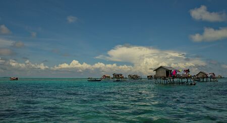 East Malaysia. Sibuan island near the city of Semporna. Calm in the fishing village of sea gypsiesの写真素材