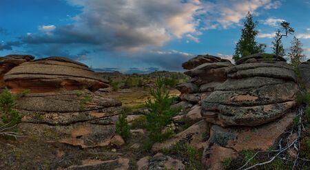 Eastern Kazakhstan. Amazing summer sunsets in the mountains Bayanaulの写真素材