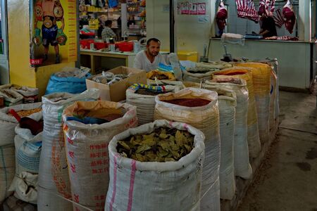 Tajikistan. 05/08/2019. The Central market in the city of Isfara. Locals sell a variety of fruits and spices grown on their land.のeditorial素材