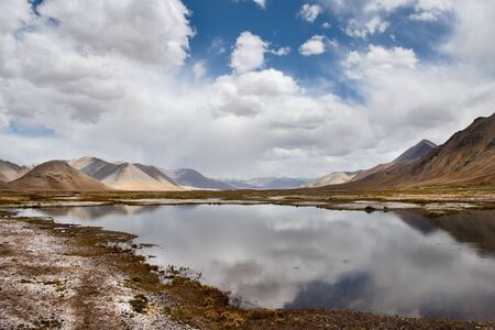 Central Asia. Kyrgyzstan. An unnamed high-mountain lake near the Pamir tract on the border with...