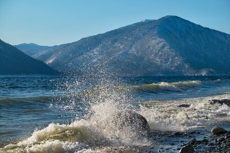 Russia. South Of Western Siberia, Altai Mountains. Splashes of autumn storm on the shore of the unsettled Teletskoye lake.の写真素材