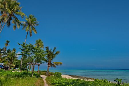 Malaysia A deserted reef island near the town of Semporna on the island of Borneo.