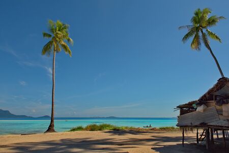 Malaysia A deserted reef island near the town of Semporna on the island of Borneo.