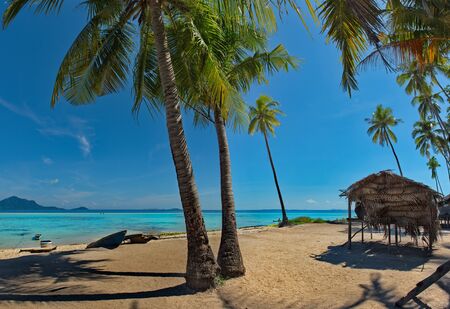 Malaysia A deserted reef island near the town of Semporna on the island of Borneo.