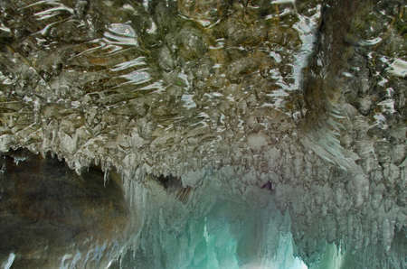 Russia. Eastern Siberia. Bizarre icicles of numerous caves and grottoes on Olkhon island of lake...