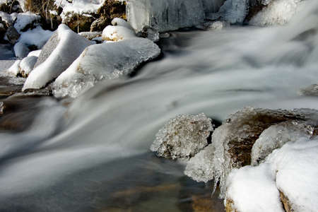 Russia. mountain Altai. An icy high-altitude stream, taken with a long shutter speed.