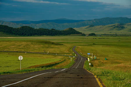 Russia. Republic Of Khakasia. Endless steppes among picturesque hilly mountains near the village of Shira.の写真素材