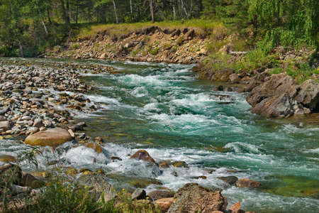 Russia. South Of Western Siberia. mountain Altai. Rocky rapids on the river Kumir near the village of Ust-Kan.の写真素材