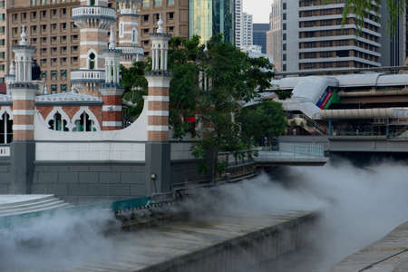 Kuala Lumpur, Malaysia. November 24, 2018. Gombak river embankment in the city center near the Jamek mosque and Sultan Abdul Samad Palace. One of the most visited tourist attractions.のeditorial素材
