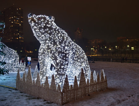 Moscow. Russia. December 20, 2020. Christmas light sculptures of huge bears on the coast of the Yauza River on Mira Avenue.のeditorial素材