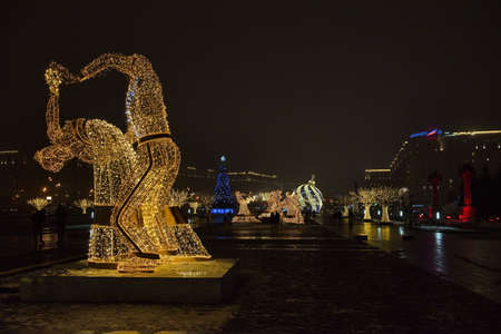 Moscow. Russia. December 20, 2020. Light sculptures of dancing couples in Victory Park on Kutuzovsky Prospekt.のeditorial素材
