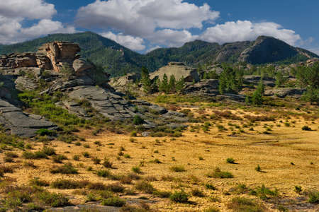 Eastern Kazakhstan. Bayanaul natural mountain Park in the middle of endless steppes. The age of the ancient remains is about 30 million years.の写真素材