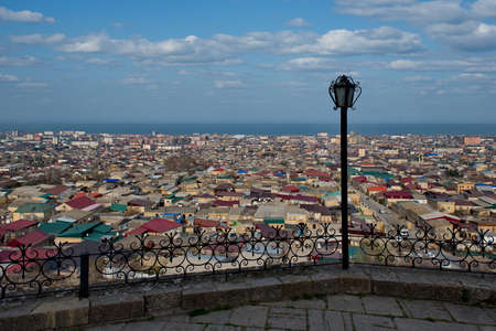 Derbent. Russia. April 09, 2021. Republic of Dagestan. View of the ancient city with a thousand-year history from the pre-Arab fortress of Naryn-Kara. The city of Derbent was founded in 438 AD.のeditorial素材