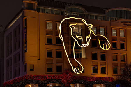 Moscow. Russia. December 20, 2020. Huge illumination in the form of a panther on the facade of the Business Center "Berlin House" on Petrovka Street.のeditorial素材