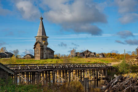 Saminsky Pogost. Russia. October 05, 2018. The ancient wooden Orthodox Church of Elijah the Prophet on the bank of the Samina River in a picturesque place of the Vologda region.のeditorial素材