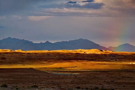 Tajikistan. Dramatic evening sky over the Pamir highway in the area of the high-altitude lake Bulunkul.の写真素材