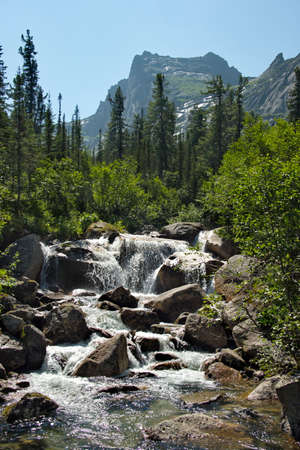 Russia. South of Siberia. Western Sayans. Numerous cascading waterfalls of the Taigish River in the Ergaki Natural Mountain Park.の写真素材