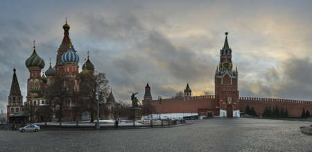 Moscow. Russia. December 21, 2020. The Kremlin Wall with the Spasskaya Tower and St. Basil's...