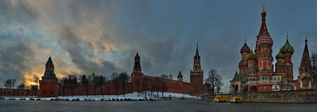 Moscow. Russia. December 21, 2020. The Kremlin Wall with the Spasskaya Tower and St. Basil's Cathedral in the New Year twilight against the backdrop of picturesque clouds of the sunset sky.のeditorial素材