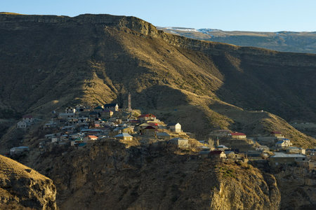 Inhelo. Russia. April 04, 2021. View of a high-mountain village located on the steep slopes of the Caucasus mountains on the left bank of the Andiyskoye Koysu River.のeditorial素材