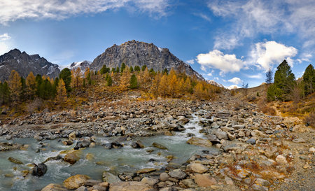 Russia. The South of Western Siberia, the Altai Mountains. Autumn view of the valley of the Aktru River, the source of which is located at the foot of the glacier on the North Chuiの写真素材