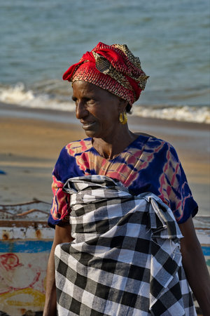 Saint-Louis. Senegal. October 15, 2021. A portrait of an elderly African woman with a tired look...
