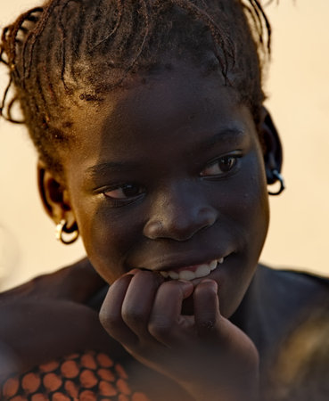 Saint-Louis. Senegal. October 11, 2023. An expressive portrait of an African girl from a small fishing village on the Atlantic Ocean.のeditorial素材