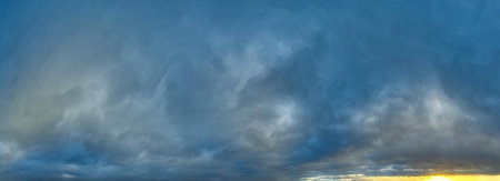 Russia. The South of Western Siberia. Gloomy sunset clouds in the evening summer sky over the fields...