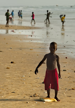 St. Louis. Senegal. October 11, 2021. Portrait of an African boy from a fishing village on the Atlantic Ocean.のeditorial素材