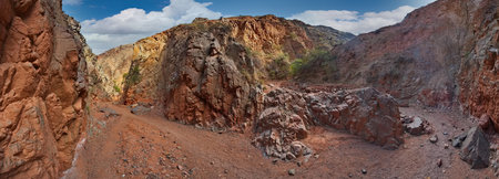 Northern Kyrgyzstan. Picturesque winding trails of the Kok Moinok canyons with red-brown rock along the Chu River.の写真素材