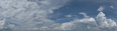 Russia. South of Western Siberia. Panorama of the daytime summer sky with cumulus clouds over the...