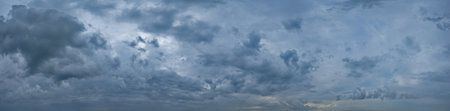 Russia, south of Western Siberia. Panoramic view of the evening sky with the setting sun and colorful clouds.の写真素材