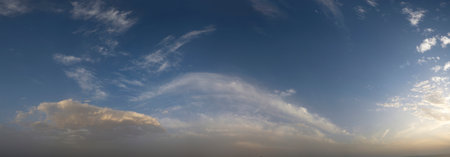 Russia, south of Western Siberia. Panoramic view of the evening sky with the setting sun and...